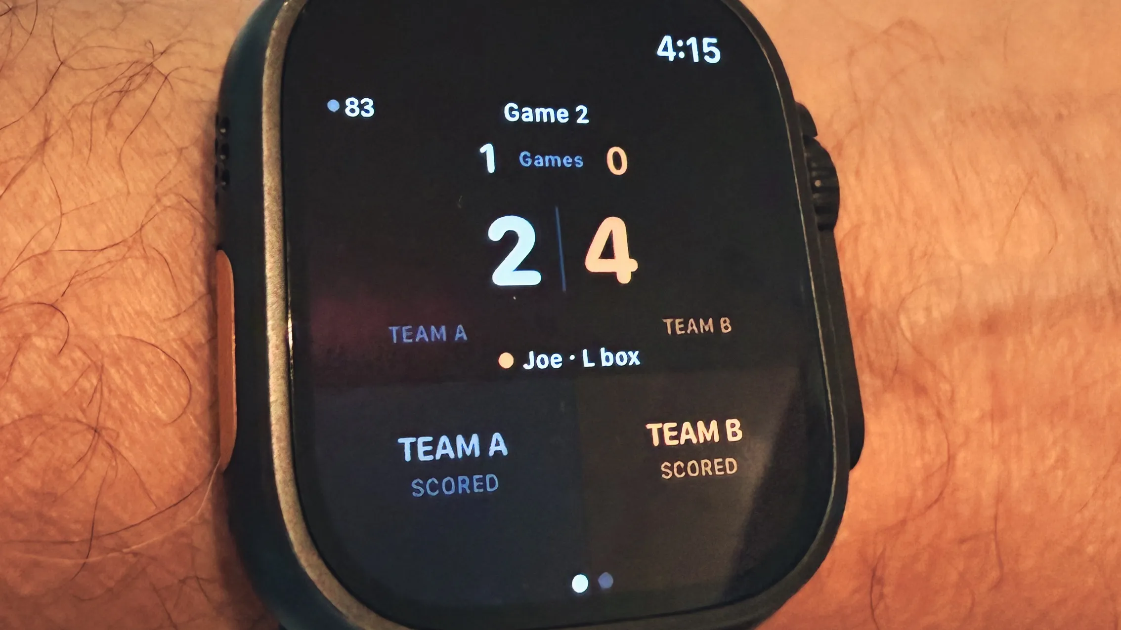 Apple Watch on wrist showing the CourtSauce Squash scoring UI mid-match, squash racquet visible in the background on a squash court